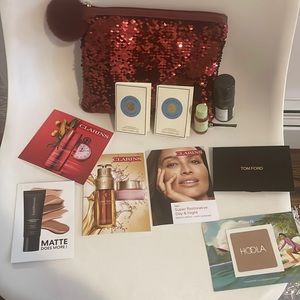 10 piece luxury beauty and sparkle ✨ pouch Tory Burch tom Ford